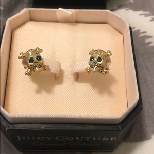 Gold skull earrings by Juicy Couture